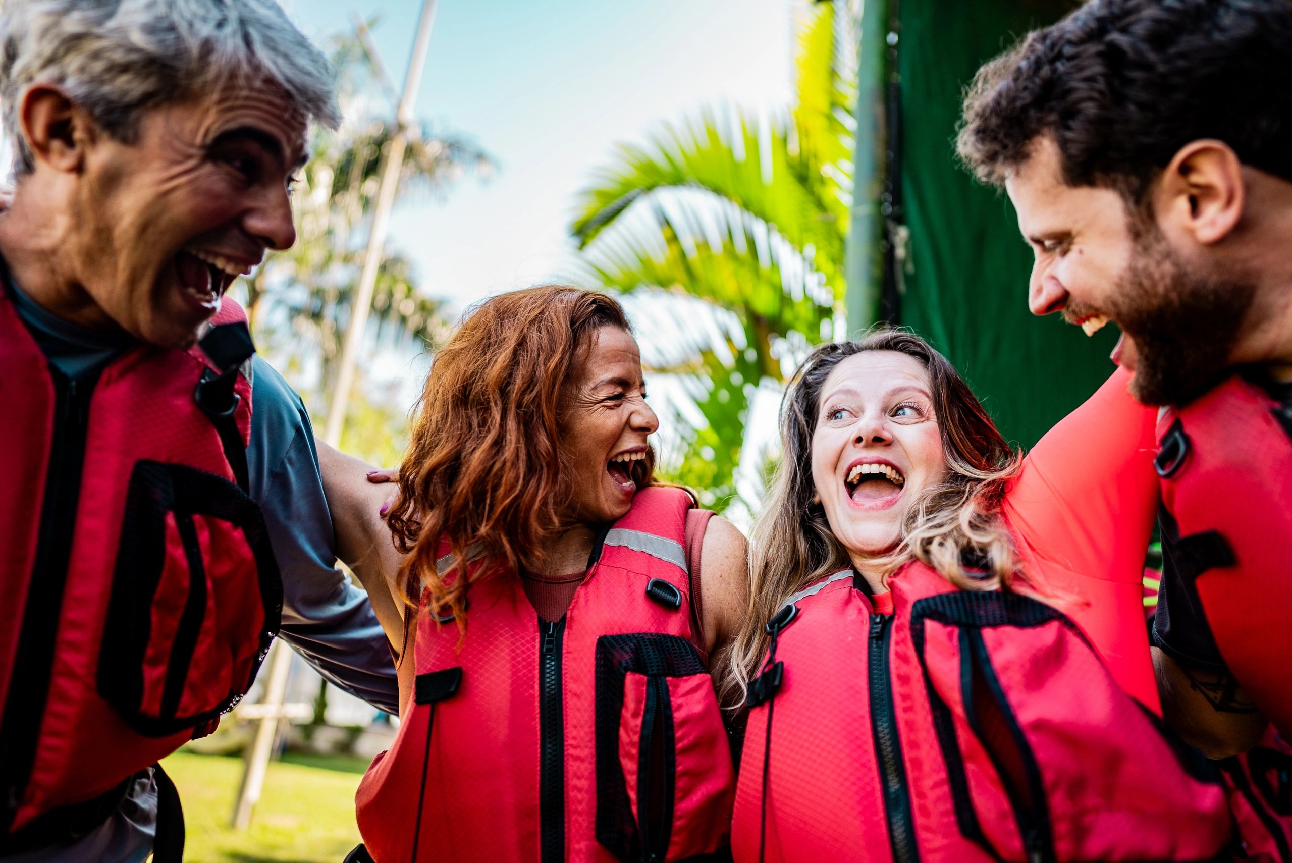 Friends embracing before an adventure experience